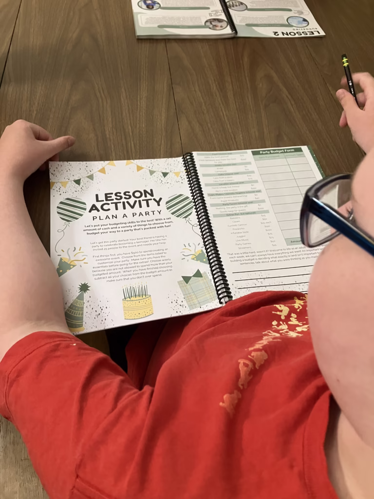 Personal finance is an important life skill to teach your homeschoolers. Beyond Personal Finance offers kids real practice in this skill. A teen looks at the lesson activity - Plan a Party - inside the Before Personal Finance workbook. 