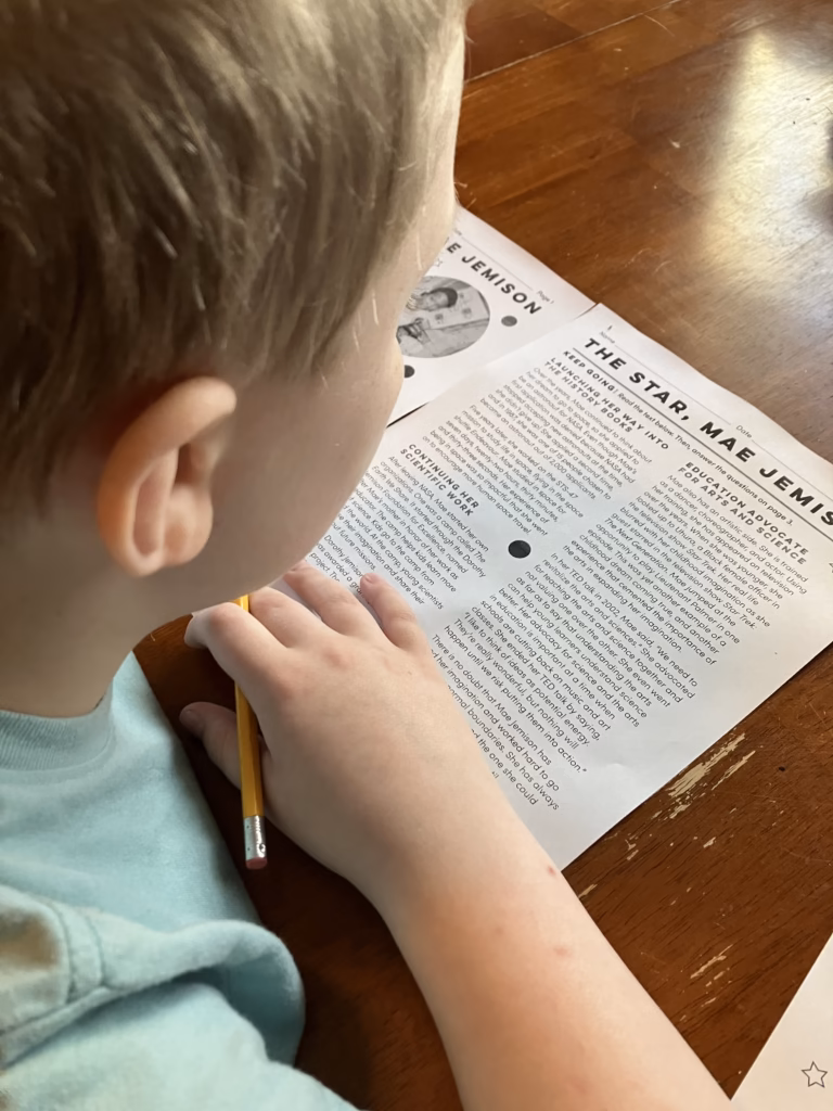 We've been exploring just some of the more then 39,000 learning resources available to us through Education.com. A child reads a printout about Mae Jemison from Education.com 