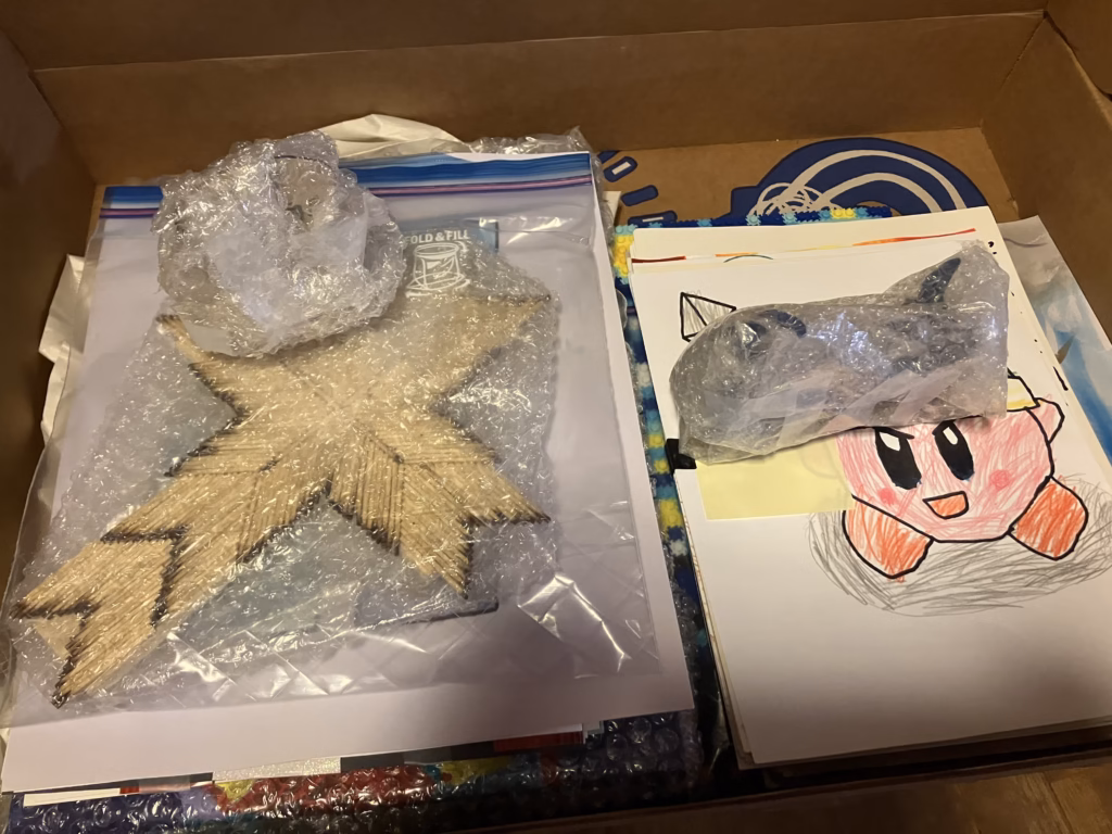 The Artkive box all packed and ready to go. It is easily fitting all the artwork with room to spare.